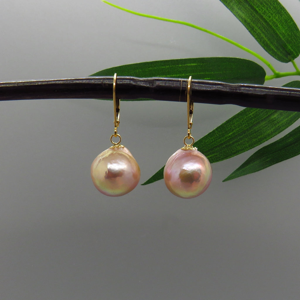 glowing peach pink round Edison pearls on gold filled lever back ear wirespearls 