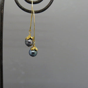 blue akoya pearls on long curved gold ear wire, small flower cap, handcrafted