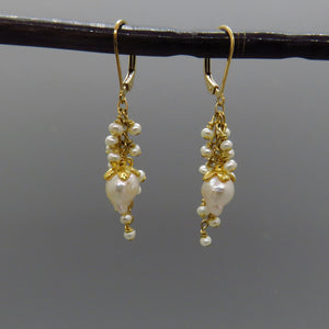 white akoya and seed pearls cluster on gold chain earrings with lever back ear wires and gold flower cap