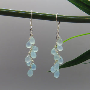 faceted aqua chalcedony drops are wire wrapped on sterling chain earrings with sterling lever back ear wires