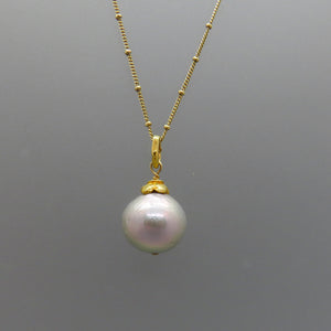 large pale gray pearl pendant with gold flower cap and chain