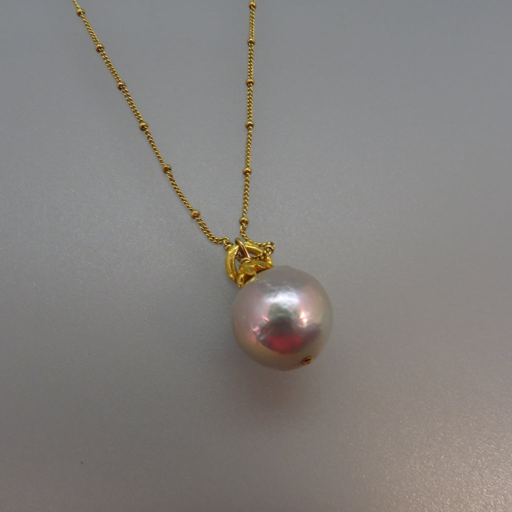 Pink and store grey pearl necklace