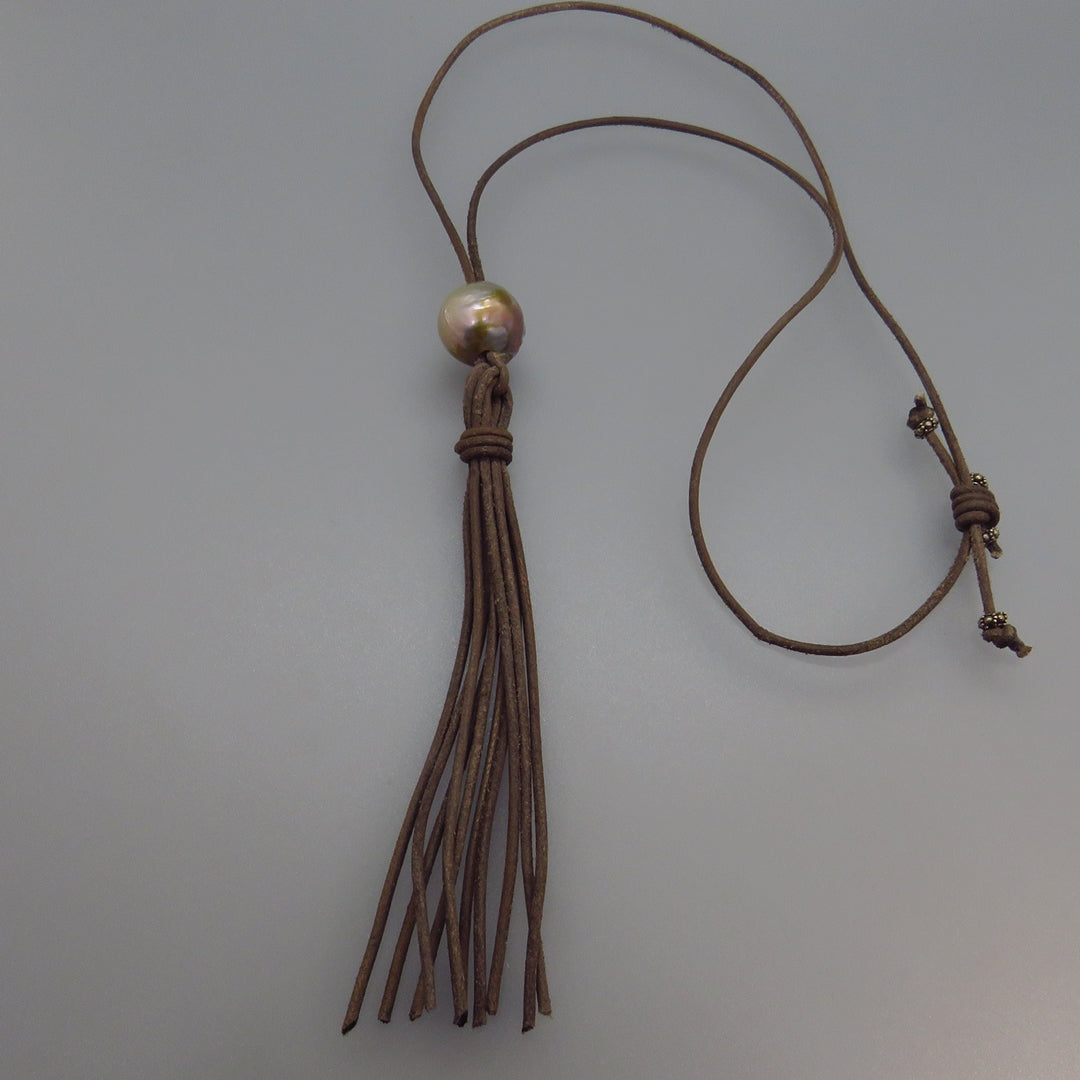 big gray pearl on gray leather necklace with 4 inch leather tassel