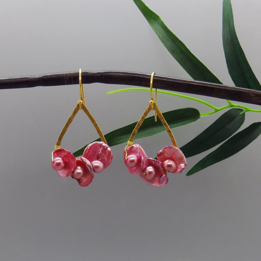 pink flat keshi pearls wire wrapped lke flowers on gold tear drop shape 