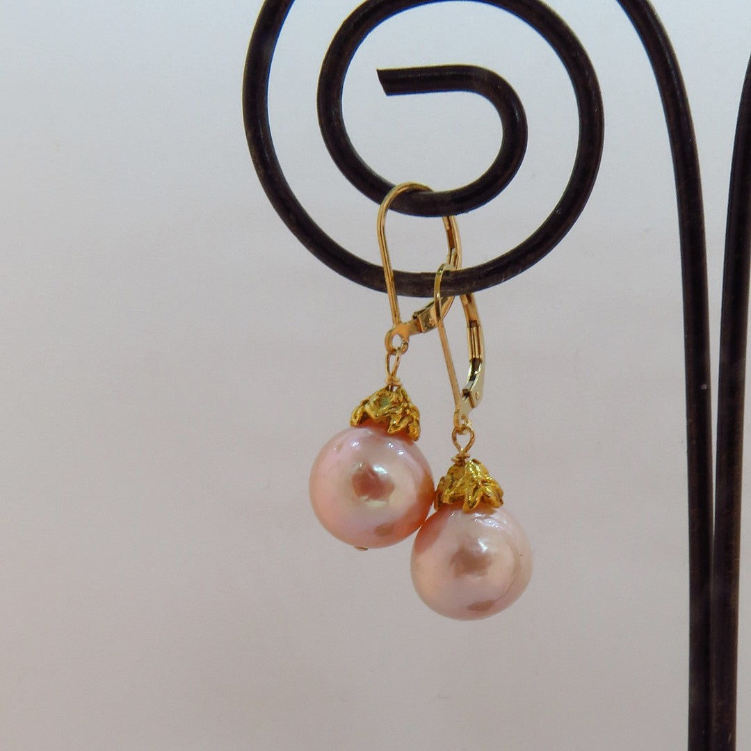 pale pink freshwater pearls, artisan gold flower cap, gold lever back ear wires