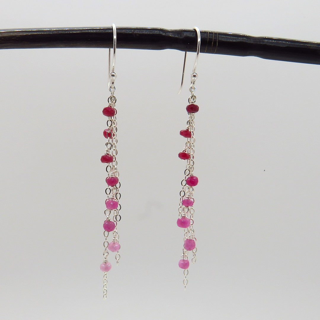 small faceted pink and red rubies dangle on 3 rows of sterling chain, french ear wire, hand crafted