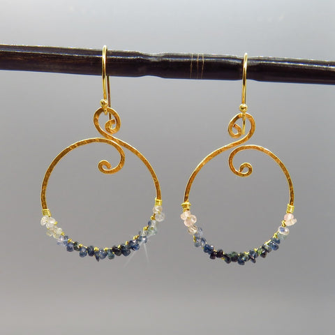 tiny faceted white and blue sapphires wrapped on artisan gold hoops with a filigree design , handcrafted