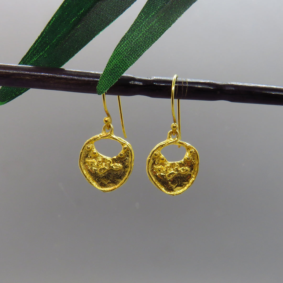 shiny high polished gold coin shape with little flowers at top, french ear wires