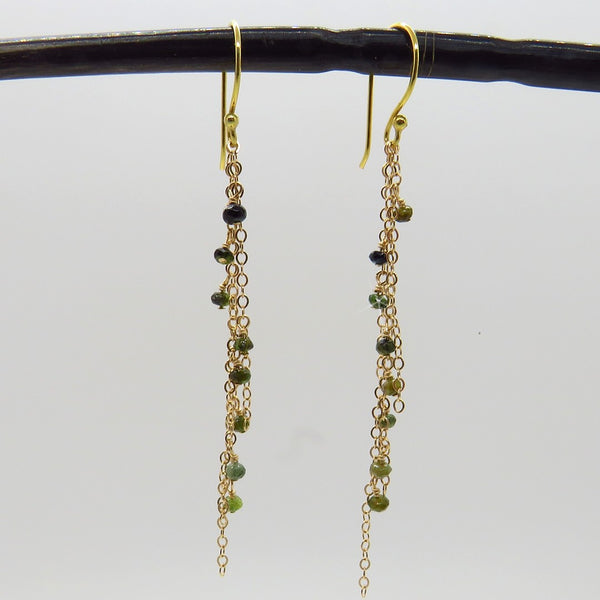 small sparkly green tourmalines dangle on delicate gold chain , long earring, handcrafted