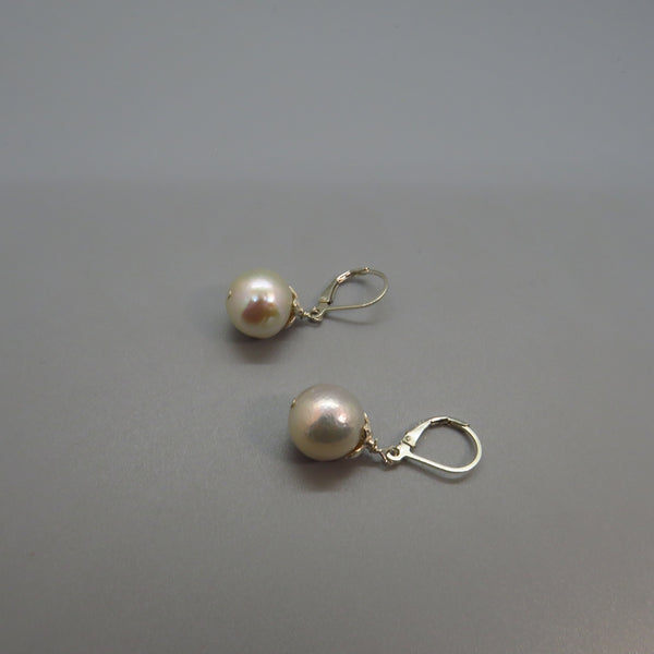 White Edison Pearl Earrings With Silver Flower Caps