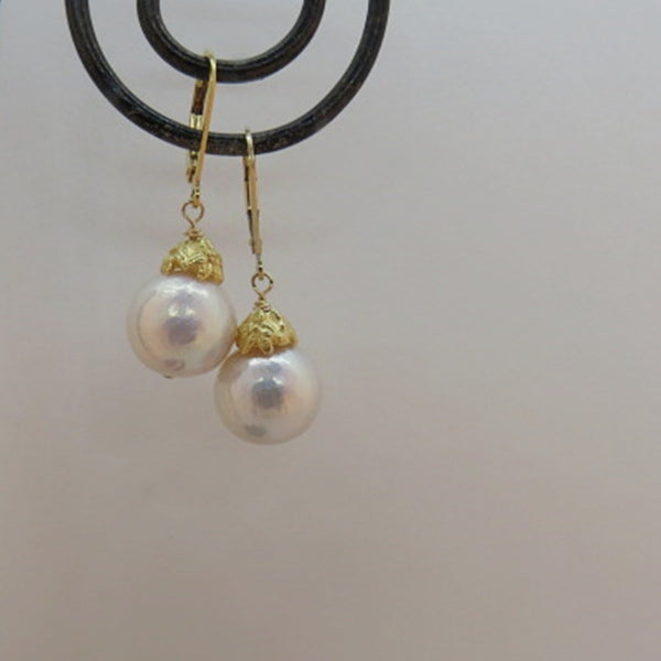 creamy white luminous edison pearls, gold artisan flower caps, gold lever back ear wires