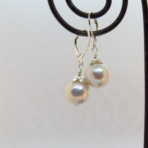 White Edison Pearl Earrings With Silver Flower Caps